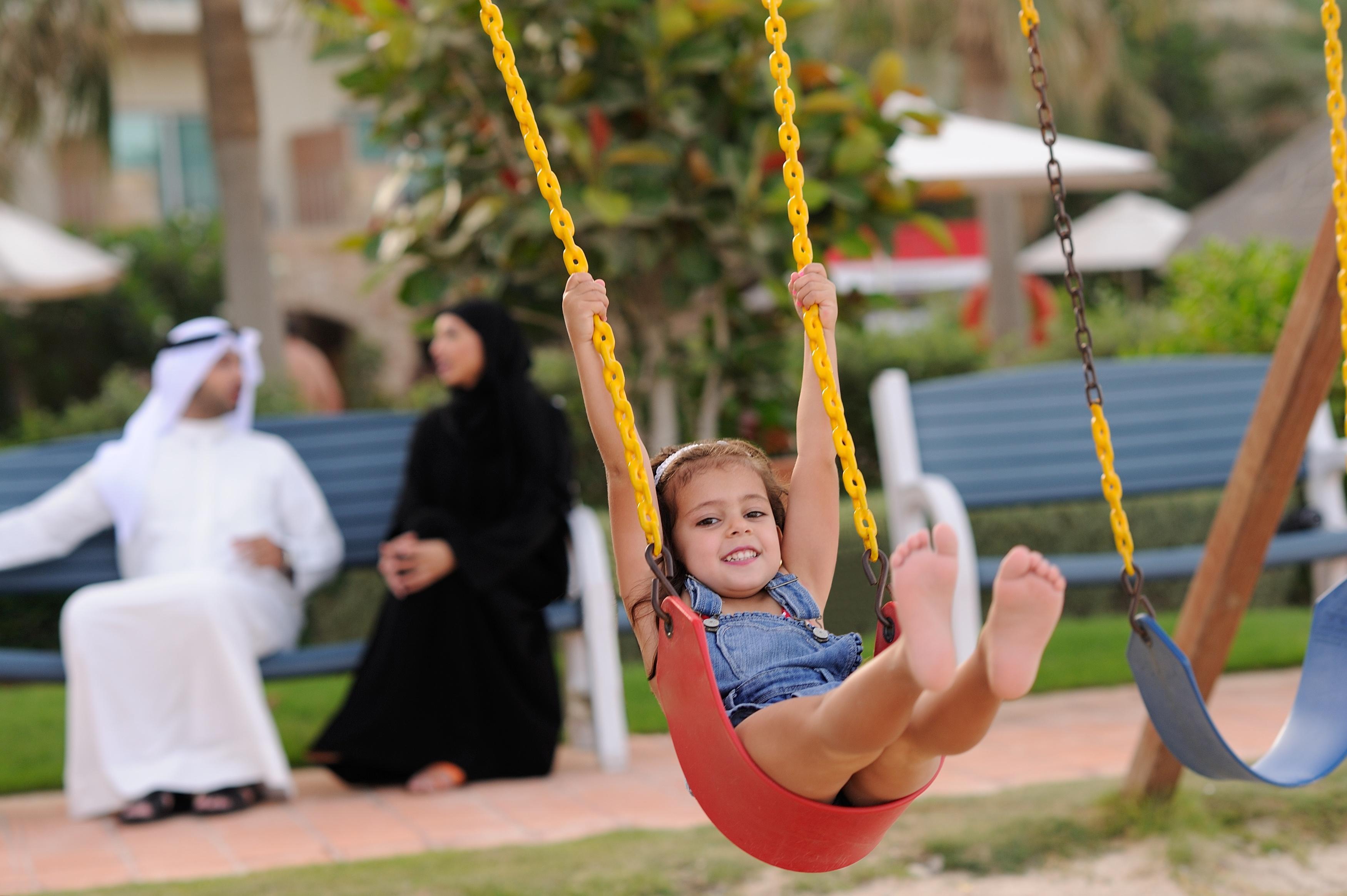 Moevenpick Hotel & Resort Al Bida'A Salmiya Buitenkant foto A child on a swing