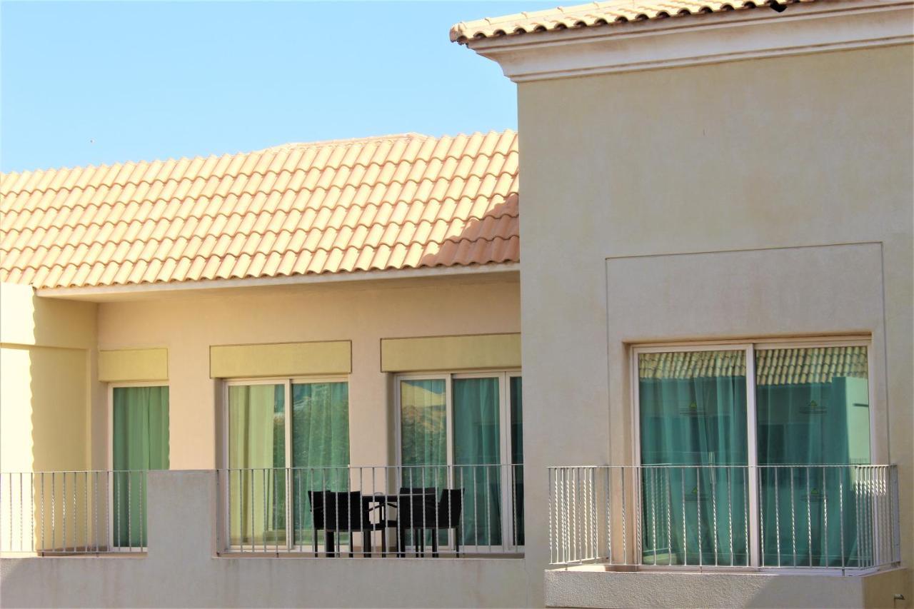 Moevenpick Hotel & Resort Al Bida'A Salmiya Buitenkant foto A typical house in the community